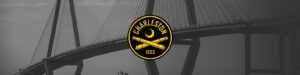Black-and-white bridge backdrop with a bold yellow Charleston 1993 logo centered, featuring a crescent and two crossed cannons beneath it.
